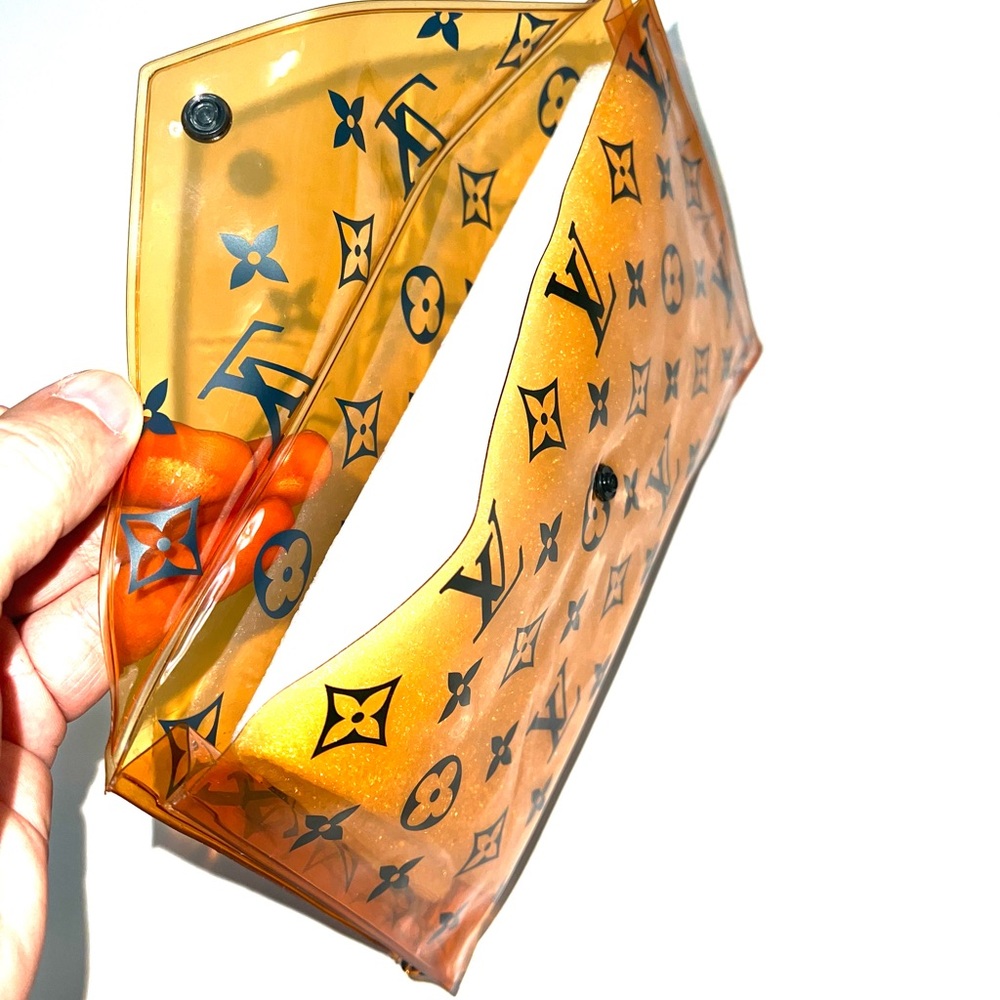 Louis Vuitton PVC Monogram Printed Envelope Pouch in orange transparent plastic - Picture 6 of 16